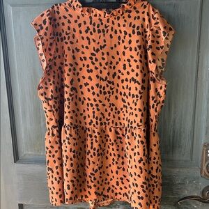 Wild Elegance Sleeveless Leopard Blouse